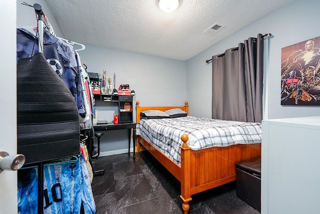 bedroom with a textured ceiling