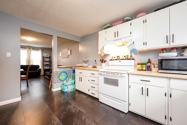 kitchen featuring white cabinetry, electric stove, and a textured ceiling