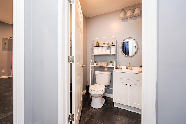 bathroom with vanity and toilet