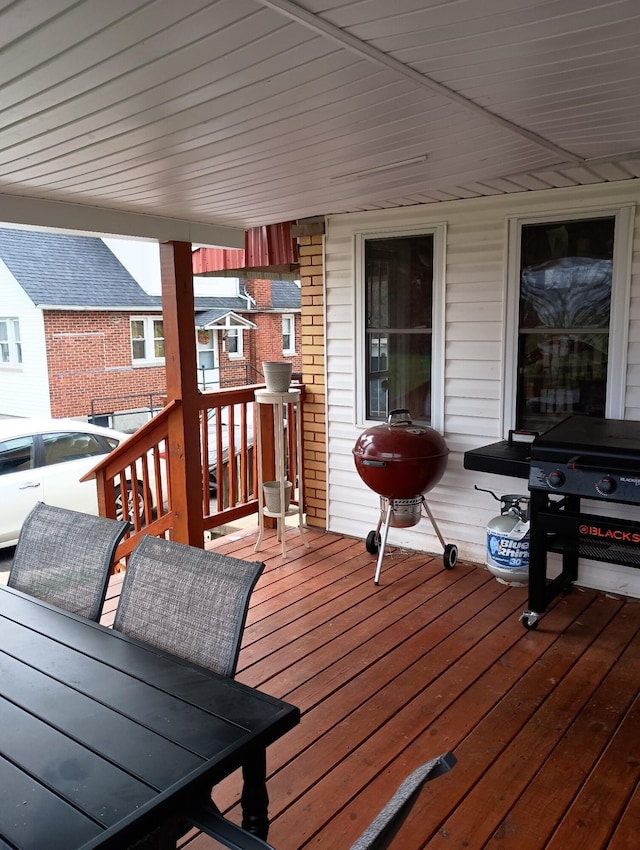 wooden deck with area for grilling