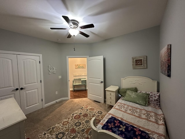 bedroom featuring a closet, baseboards, ceiling fan, and dark carpet