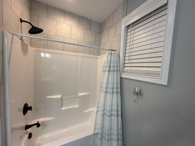 full bath with shower / bath combination with curtain