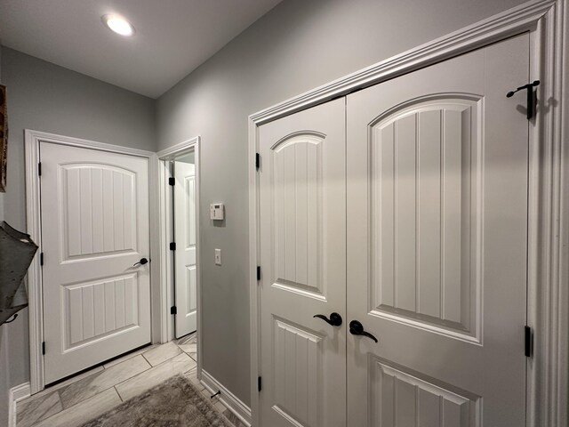 corridor featuring recessed lighting