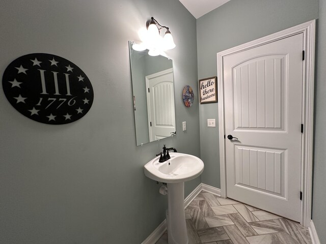 bathroom featuring baseboards