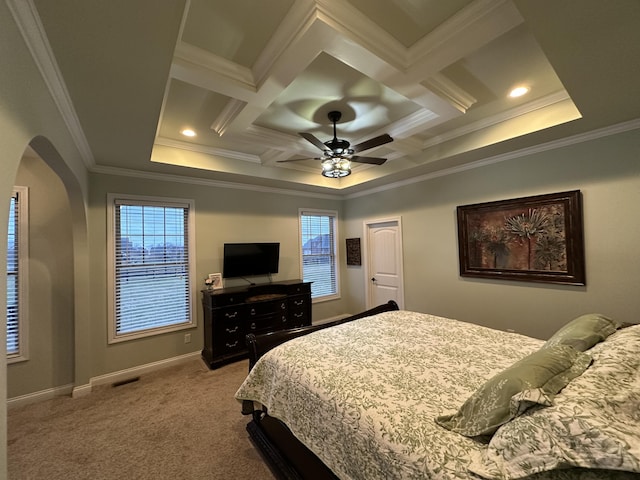 carpeted bedroom with visible vents, arched walkways, coffered ceiling, and baseboards