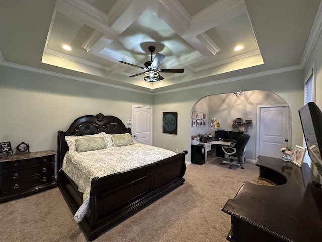 carpeted bedroom featuring crown molding, a ceiling fan, and coffered ceiling