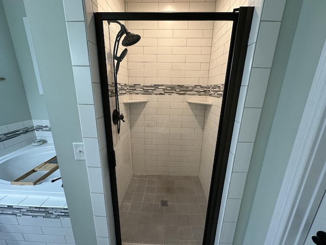 bathroom with a shower stall