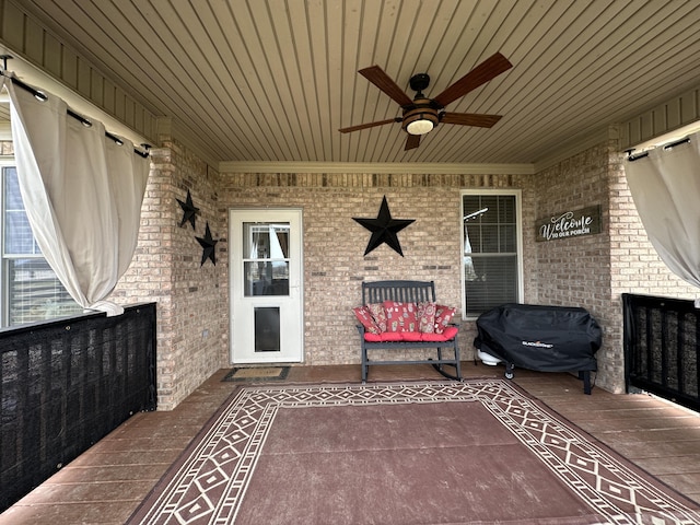 view of patio / terrace featuring a ceiling fan