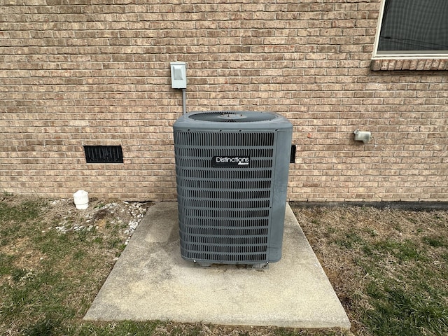 details with brick siding and central AC