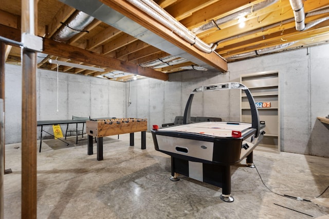 playroom with concrete flooring