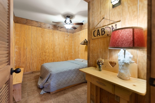 tiled bedroom featuring wood walls