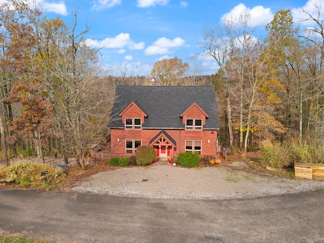 chalet / cabin featuring driveway