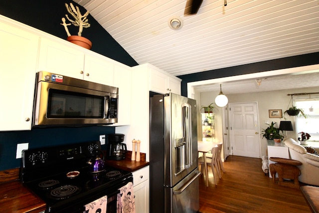 kitchen featuring lofted ceiling, dark hardwood / wood-style flooring, white cabinetry, and appliances with stainless steel finishes