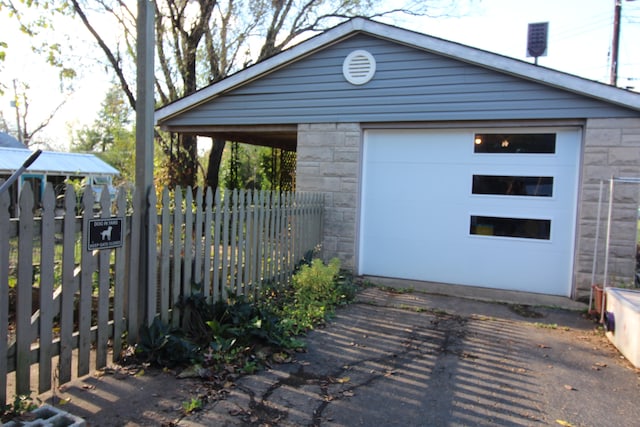 view of outbuilding featuring a garage