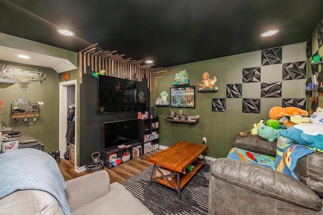 living area featuring wood finished floors, recessed lighting, and baseboards