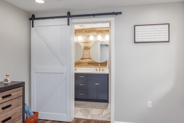 bathroom with vanity and baseboards