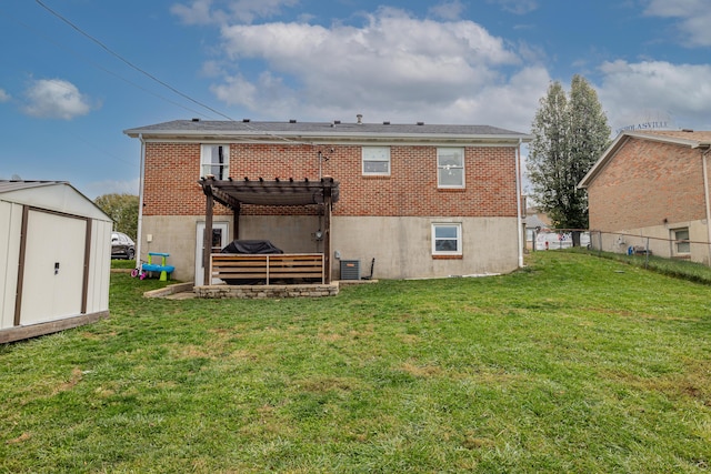back of property featuring a storage unit, a pergola, brick siding, an outbuilding, and central AC unit