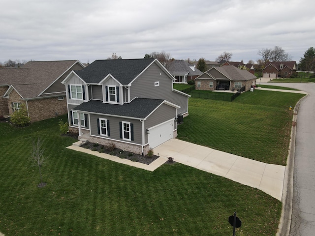 528 Old Station Rd, Frankfort, KY 40601 - craftsman-style house featuring concrete driveway, a front lawn, board and batten siding, roof with shingles, and a residential view