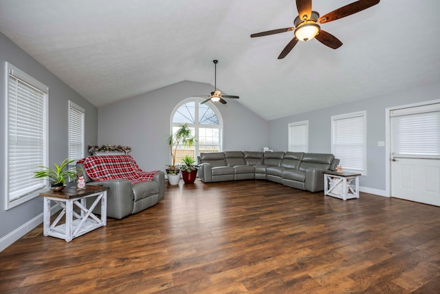 living room featuring ceiling fan, dark hardwood / wood-style flooring, and vaulted ceiling