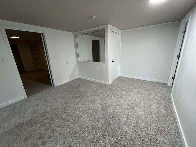 unfurnished room with carpet flooring