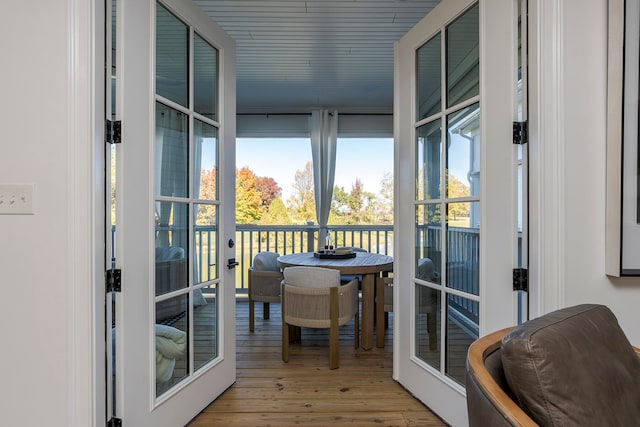 sunroom with french doors and a wealth of natural light