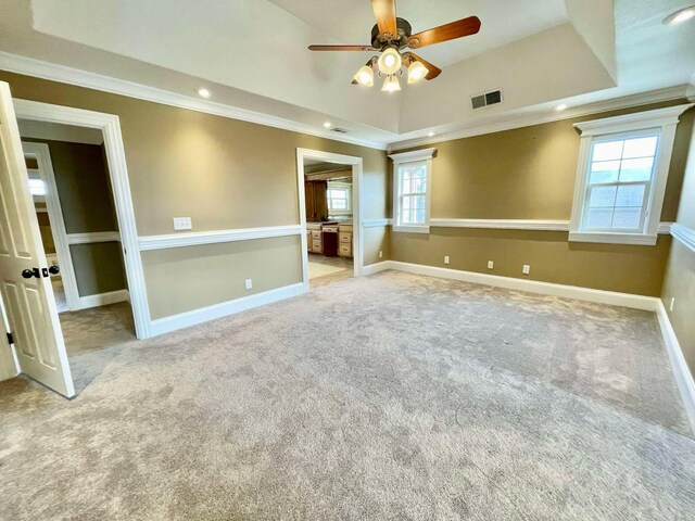 additional living space featuring ceiling fan, light colored carpet, and vaulted ceiling