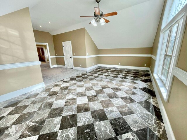 bonus room featuring vaulted ceiling and ceiling fan