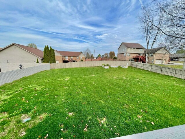 view of home's exterior with a lawn and a garage