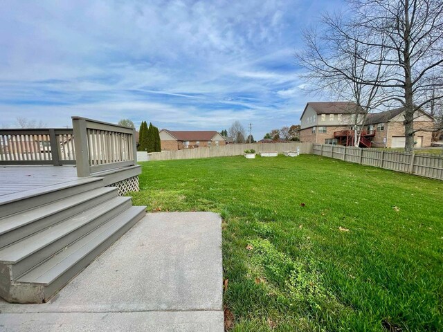 view of yard featuring a deck