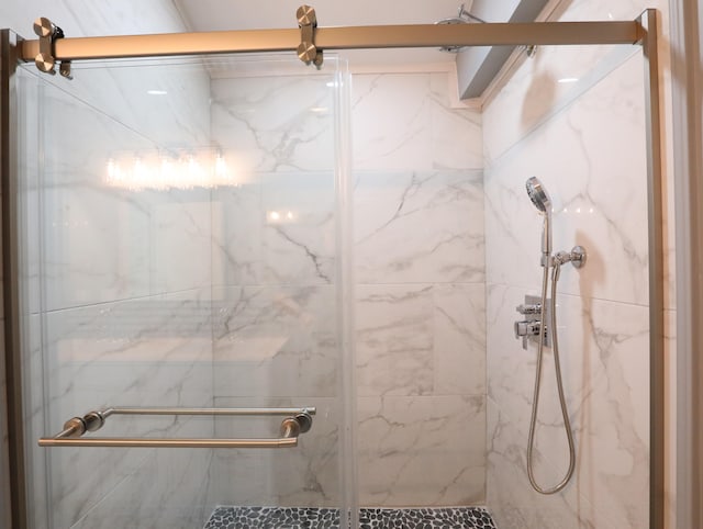 bathroom featuring an enclosed shower