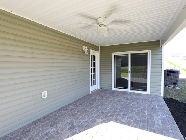 view of patio featuring central air condition unit and ceiling fan