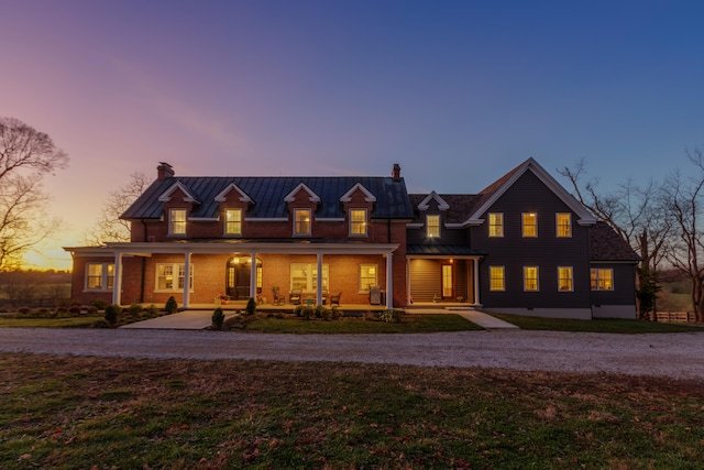 view of front of property featuring covered porch