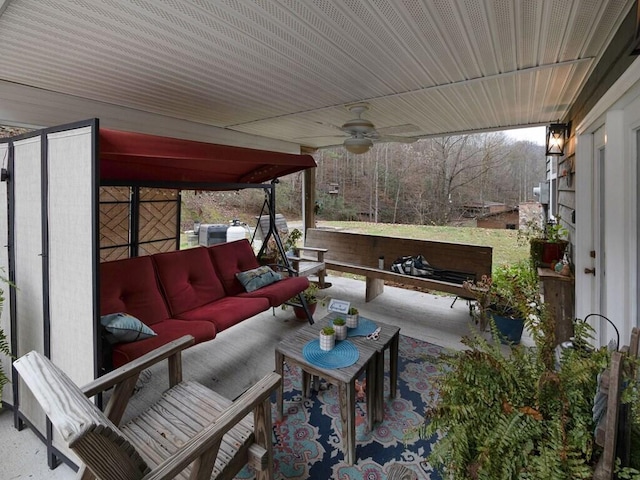 view of patio featuring an outdoor hangout area and ceiling fan