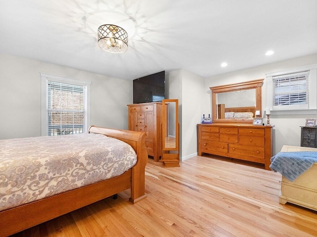 bedroom with light wood-type flooring