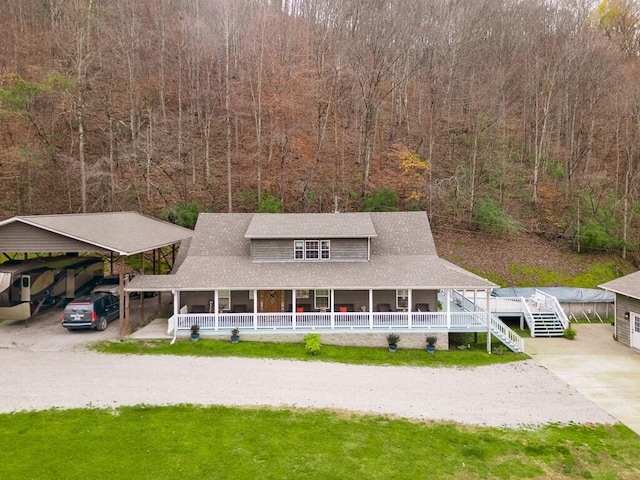 view of front of property featuring a carport