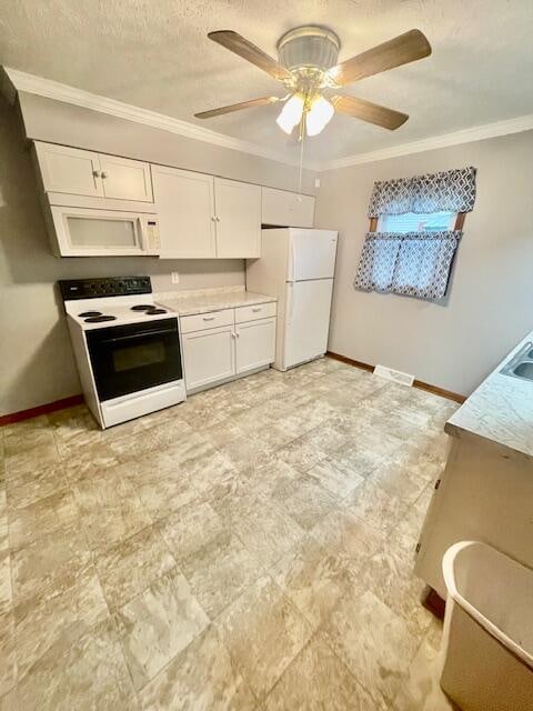 kitchen featuring ceiling fan, white cabinets, white appliances, and ornamental molding