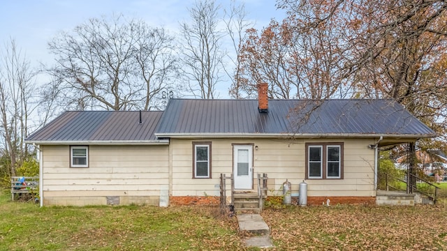 exterior space with a front yard