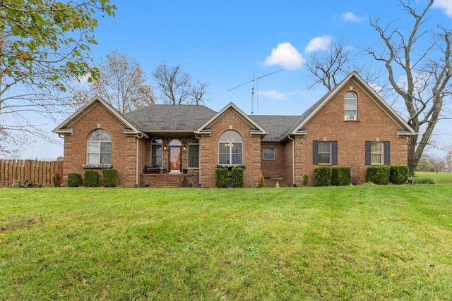 view of front facade featuring a front yard