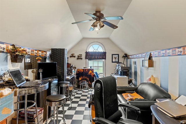 office space featuring vaulted ceiling and ceiling fan