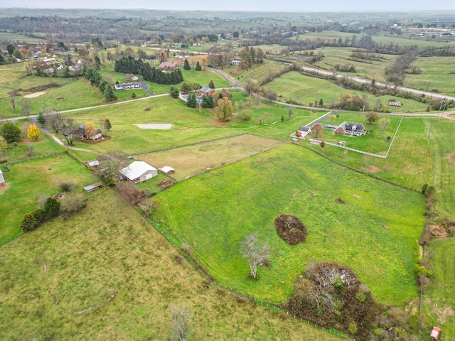 birds eye view of property featuring a rural view