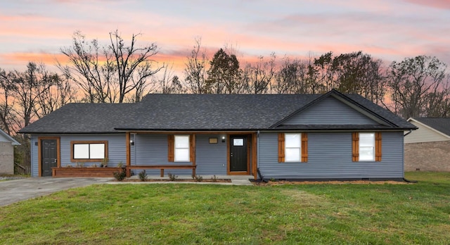 view of front of house with a lawn