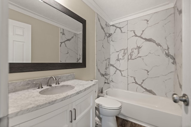 full bathroom with vanity, crown molding, hardwood / wood-style flooring, toilet, and tub / shower combination