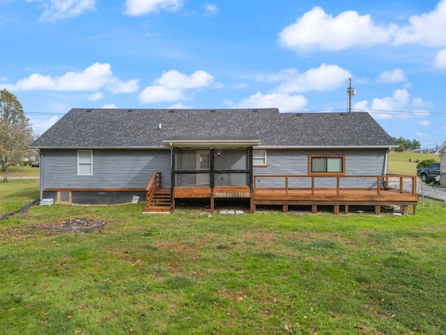 back of house with a lawn and a wooden deck