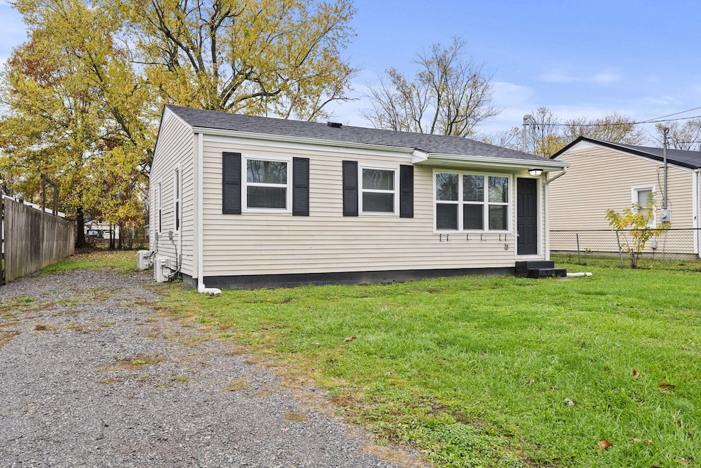 view of front of property with a front lawn