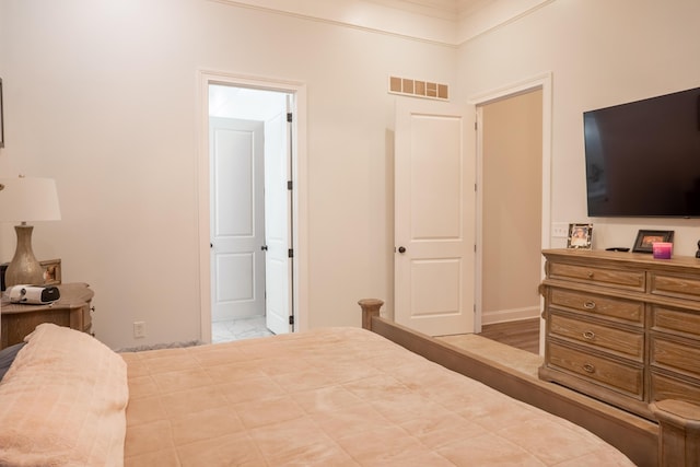 bedroom with visible vents