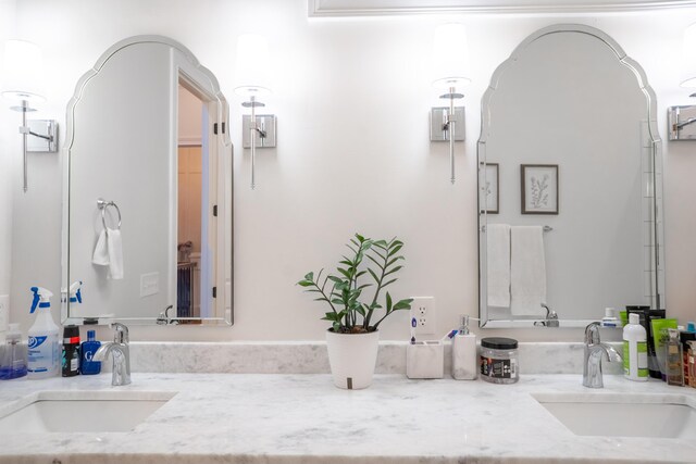 bathroom featuring vanity, toilet, and a shower with door