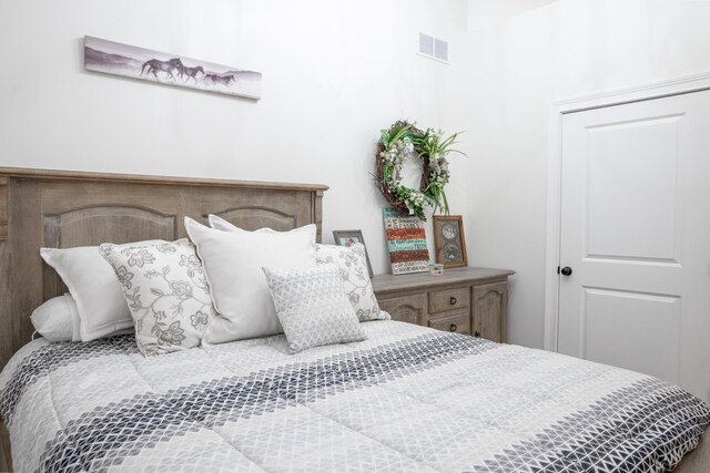 bedroom with wood-type flooring