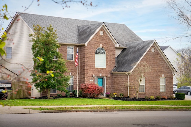 view of front of property featuring a front yard