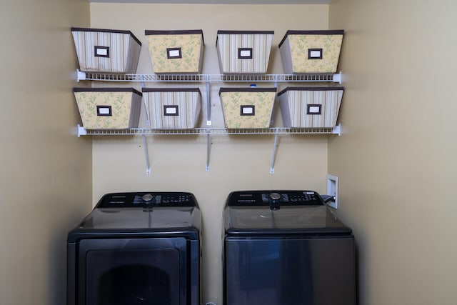 laundry area featuring washing machine and dryer