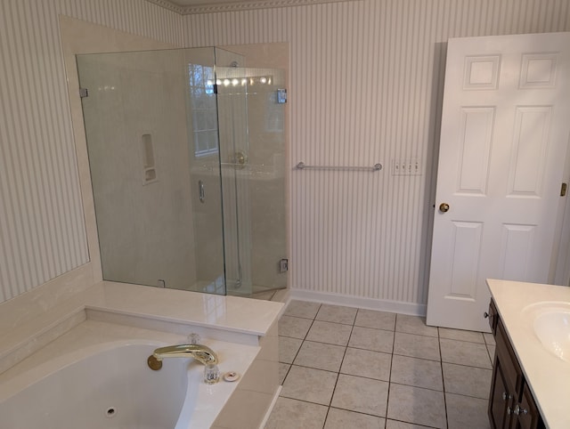 bathroom featuring tile patterned flooring, vanity, and plus walk in shower